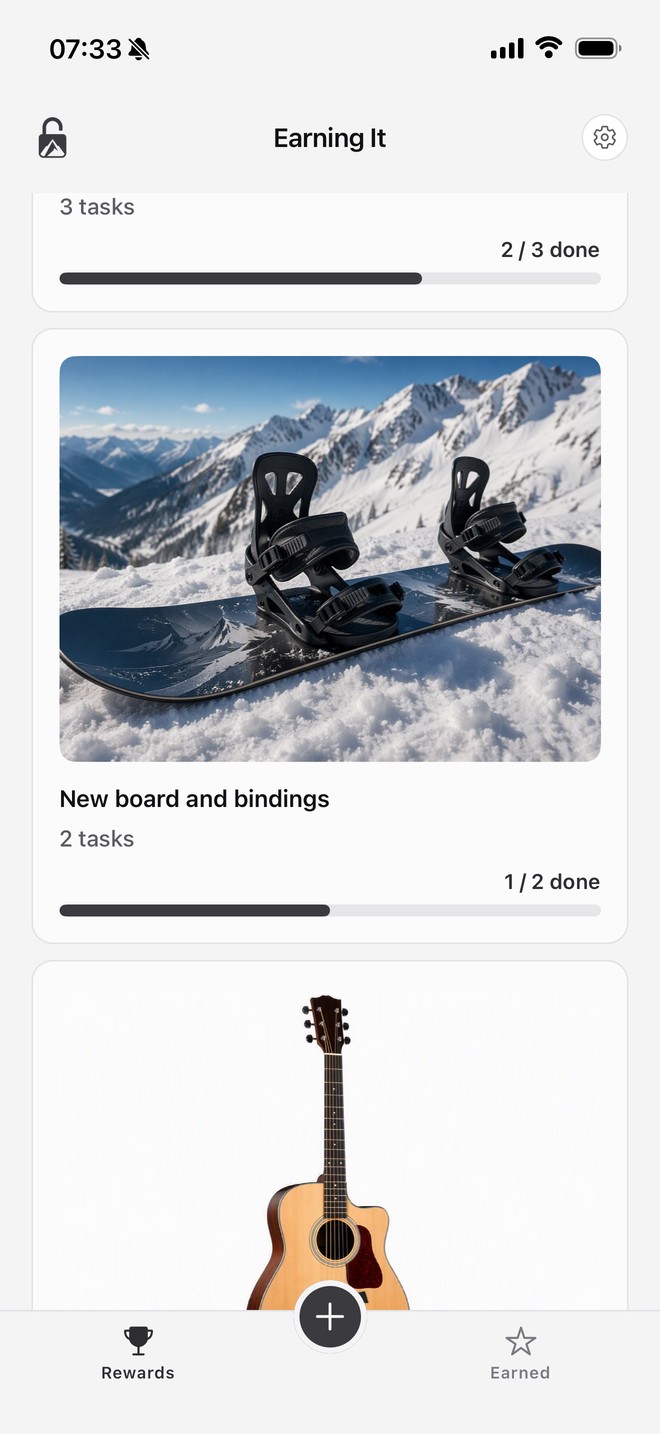Earning It home screen in the Light theme showing the snowboard reward card at 1 of 2 tasks done